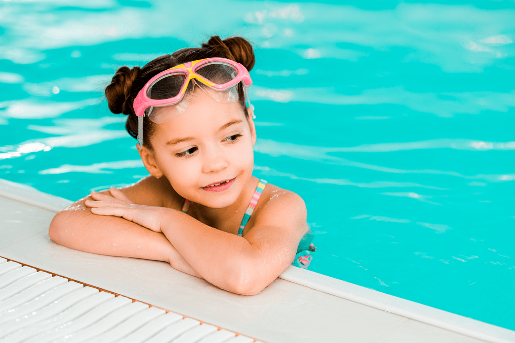adorable-child-in-googles-swimming-near-poolside-i-2022-12-16-20-21-30-utc